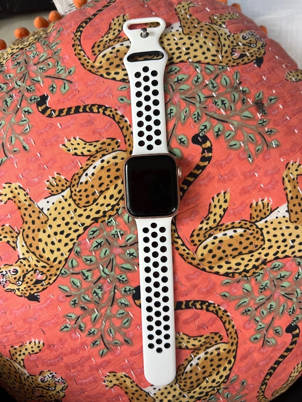 Apple Watch with White and Black Nike Perforated Sport Band
